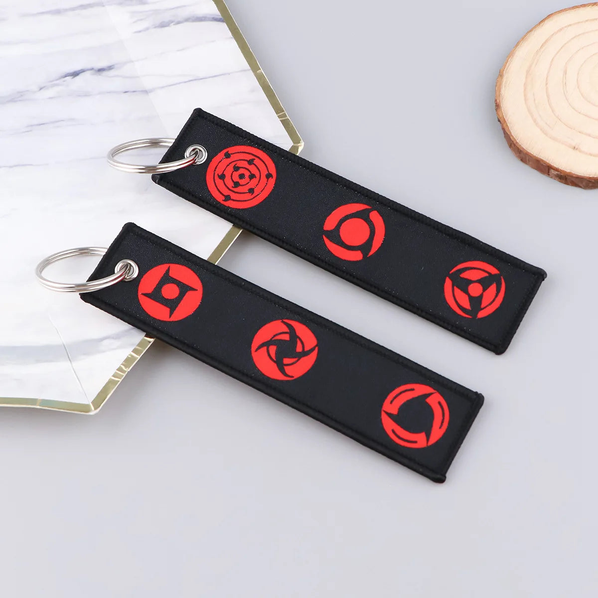 Porte-Clé Naruto - Mangekyô Sharingan Brodé